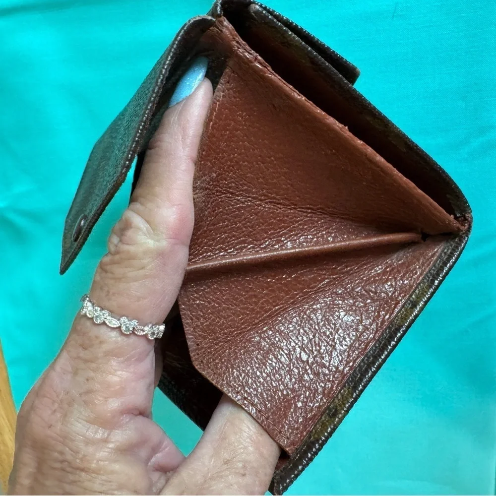 Louis Vuitton Double. Snap Monogram Wallet